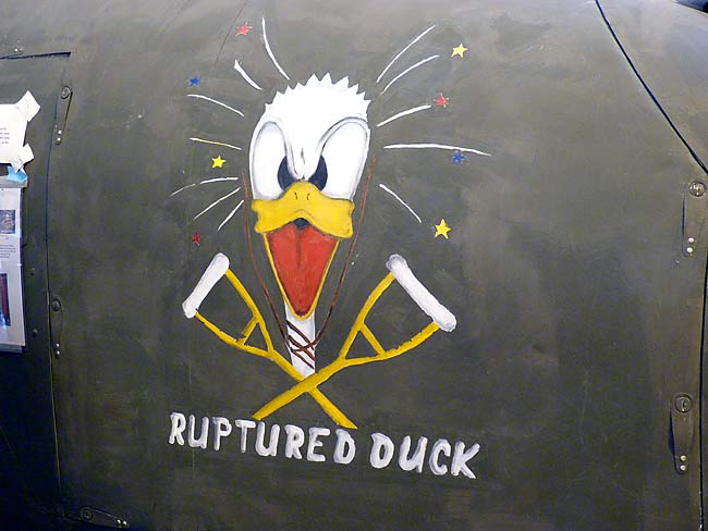 09B25RupturedDuckMachineGunNoseArt