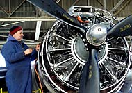 Steve Grubesich  works on the Berlin Airlift Museum's Douglas C-54