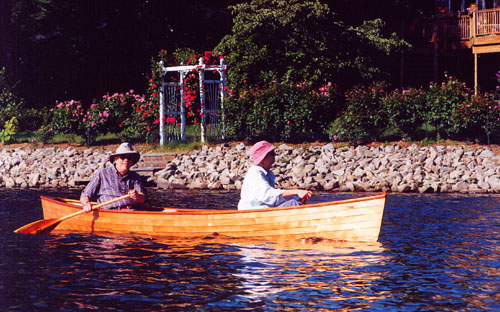 02PaddlingTheirLapstrakeCanoe