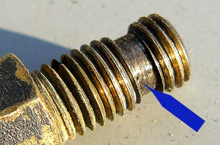 Lawnmower bleed hole clogged