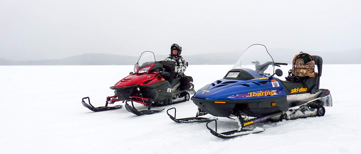 61SnowmobilingOnLakeUmbagog