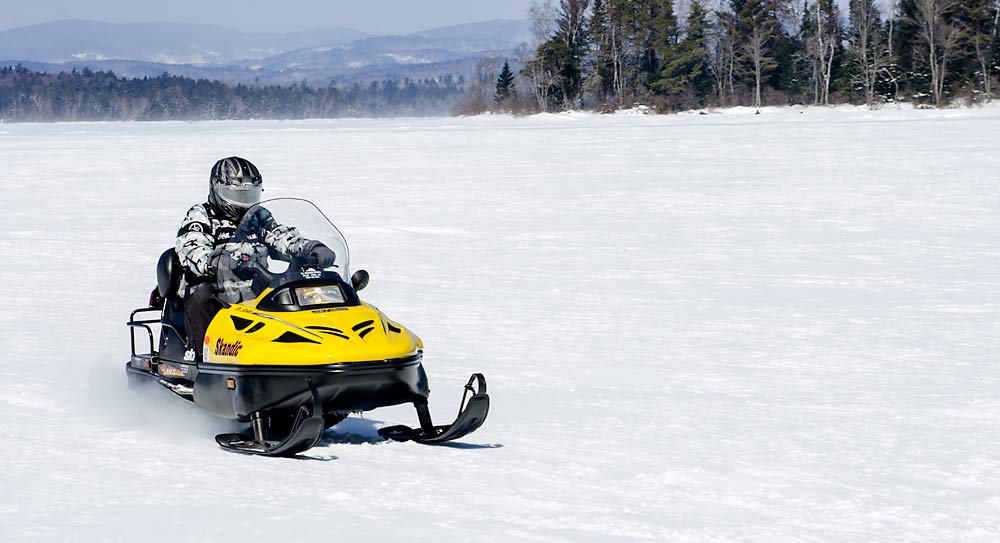 62SnowmobilingOnLakeUmbagog