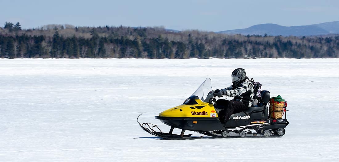 64SnowmobilingOnLakeUmbagog